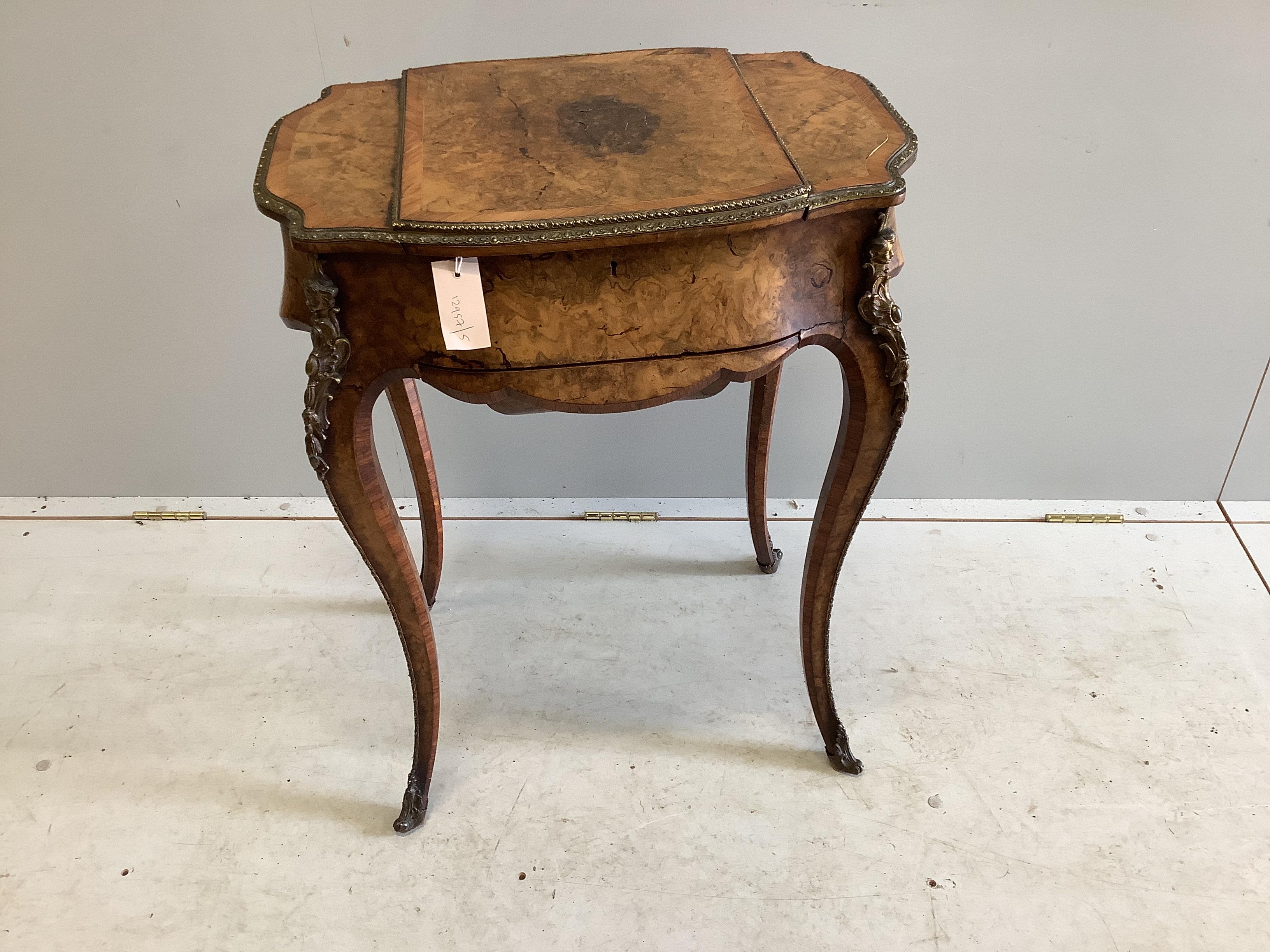 A Victorian gilt metal mounted tulip banded burr walnut enclosed dressing table/work box, width 56cm, depth 39cm, height 73cm